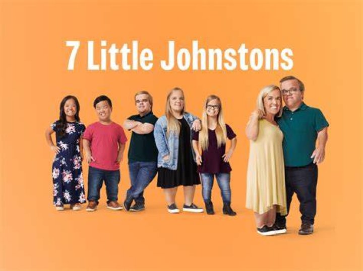 7 Little Johnstons smiling in group photo