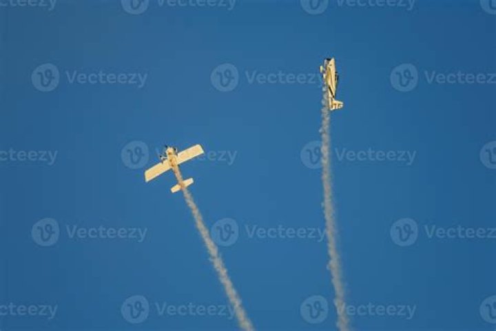Aerobatic planes/making stunts in the air. Aerobatic planes/making stunts in the air.