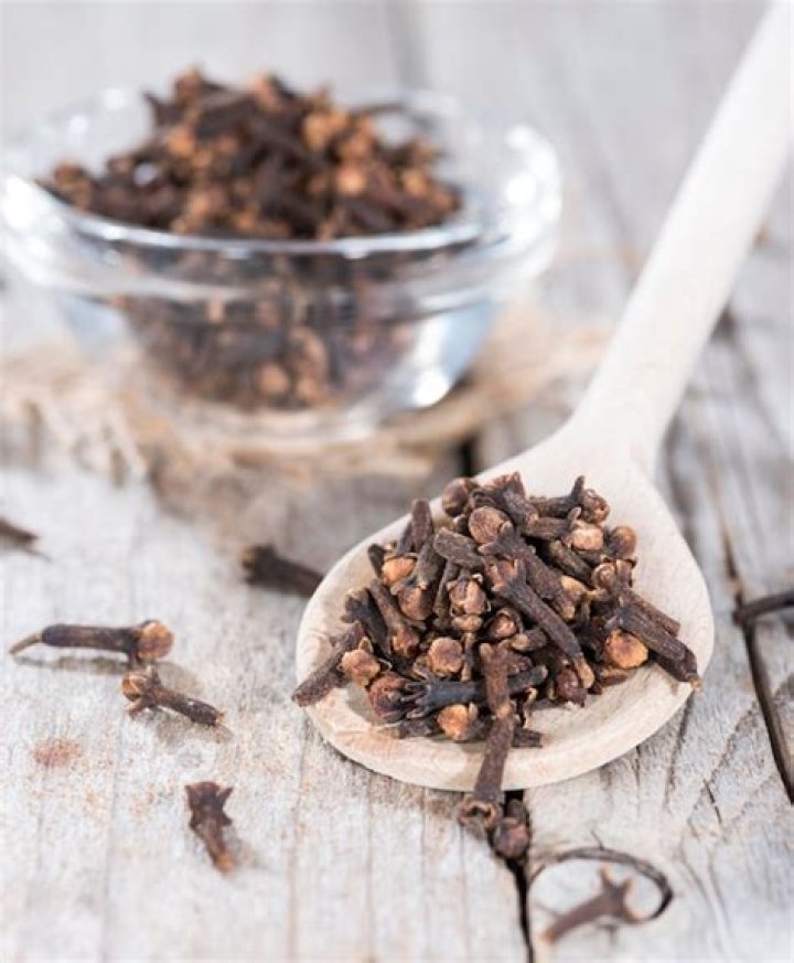 Cloves on a wooden spoon Cloves on a wooden spoon