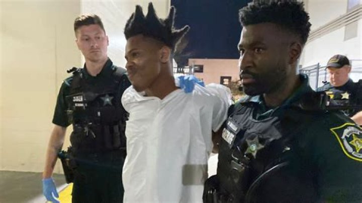 Keith Moses appeared to be smirking while he was taken into custody by police.